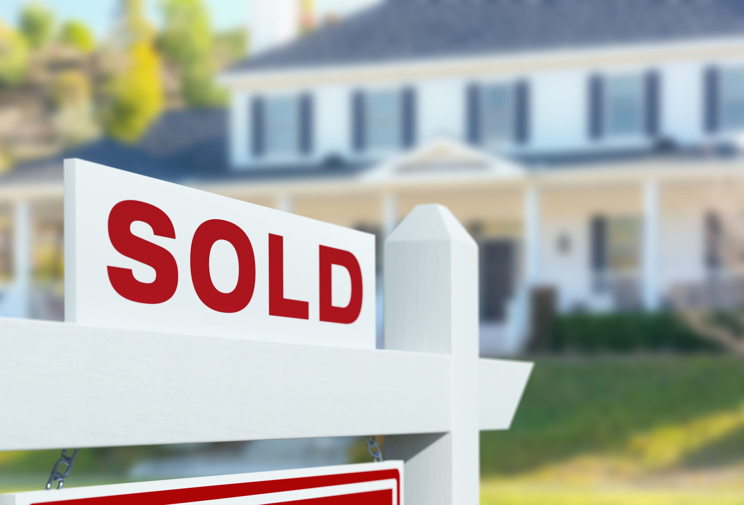 sold-for-sale-real-estate-sign-in-front-of-new-royalty-free-image-1724461428